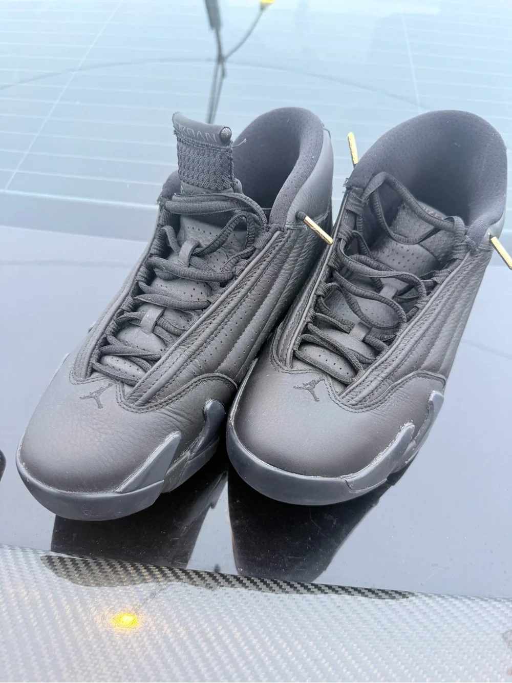 Men's Black Jordan’s Athletic Sneakers with Gold Accents